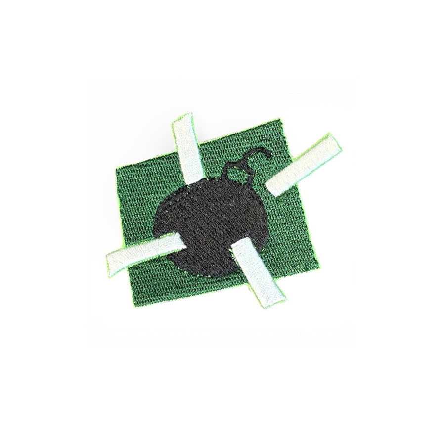 A dark green rectangle, with a black bomb embroidered on it
